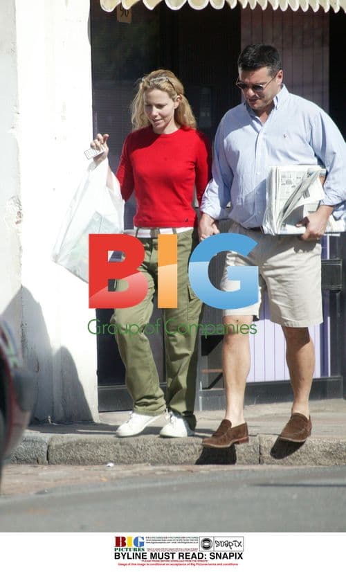 Sally Phillips and husband Andrew Bermejo strolling in London