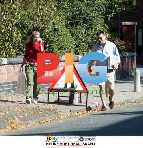 TV Comedian Sally Phillips and Husband Stroll in London