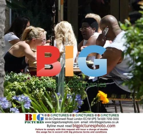 Britney Spears stretching after meal in Santa Monica