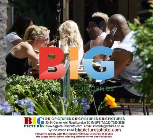 Britney Spears stretches after lunch