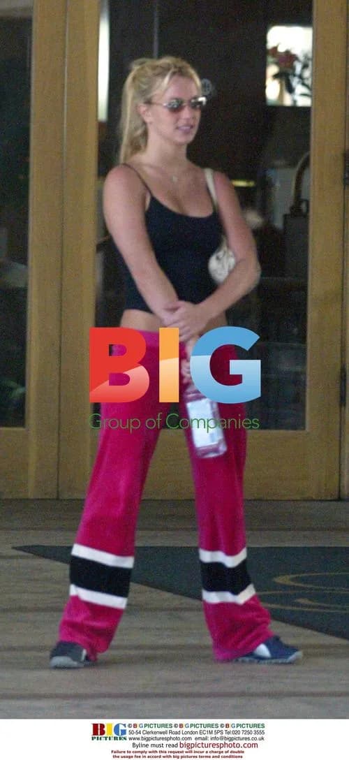 Britney Spears stretches after meal with bodyguard