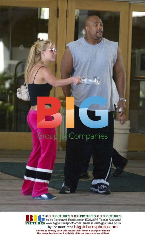 Britney Spears stretches after meal