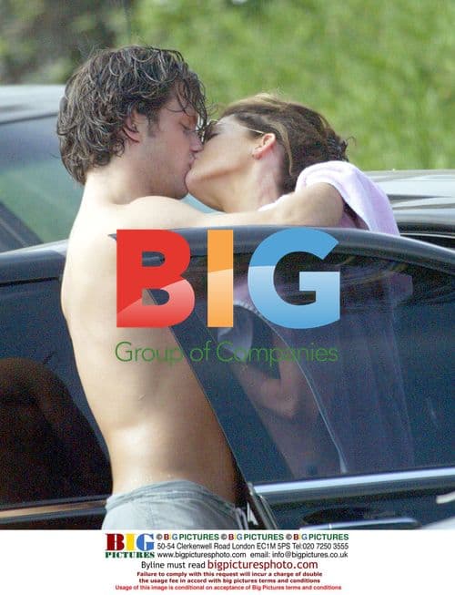 Lara Flynn Boyle and boyfriend on the beach