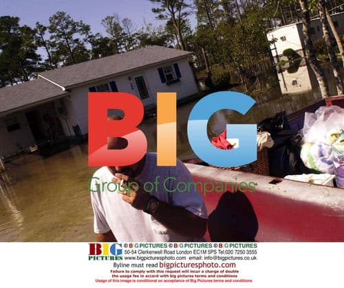 Man loads truck after Hurricane Isabel