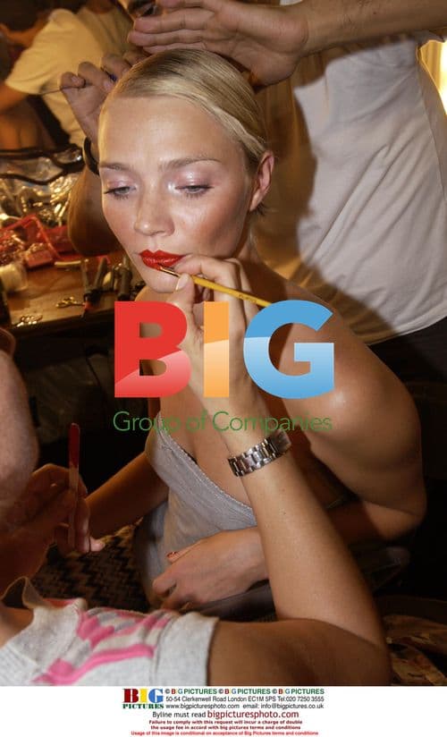 Jody Kidd has makeup applied before London fashion show