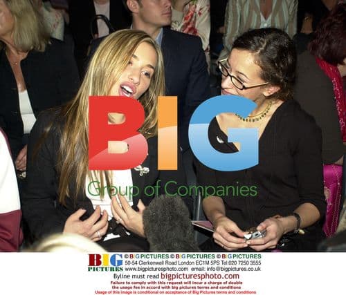 Musician playing guitar on stage