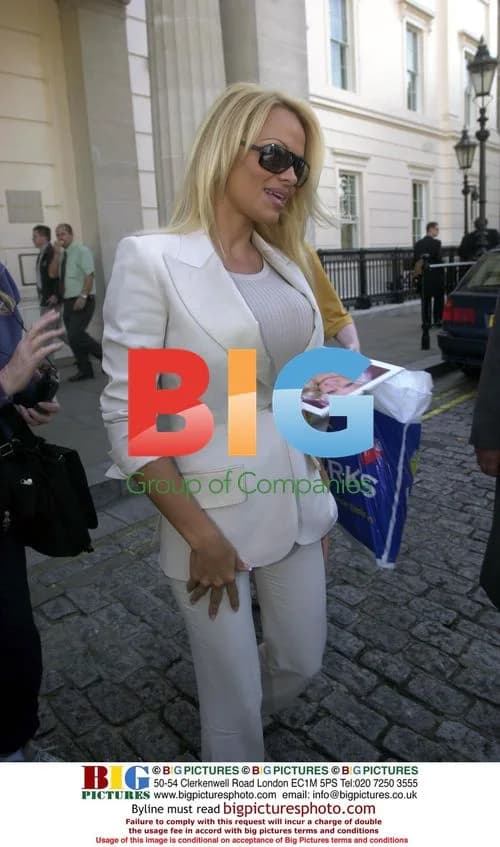 Pamela Anderson Leaving Hotel in London