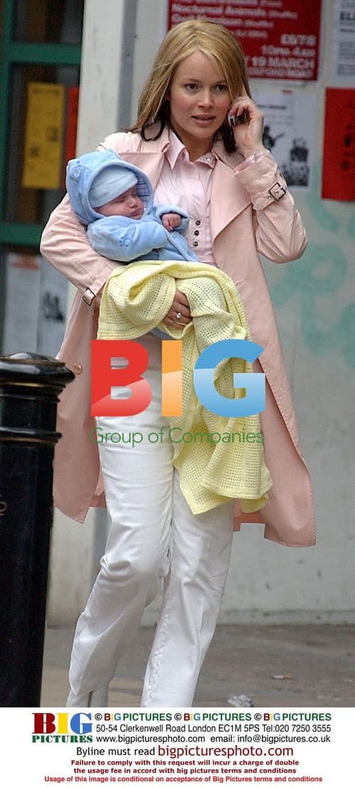 Amanda Holden Holds Baby After Cutting It Filming