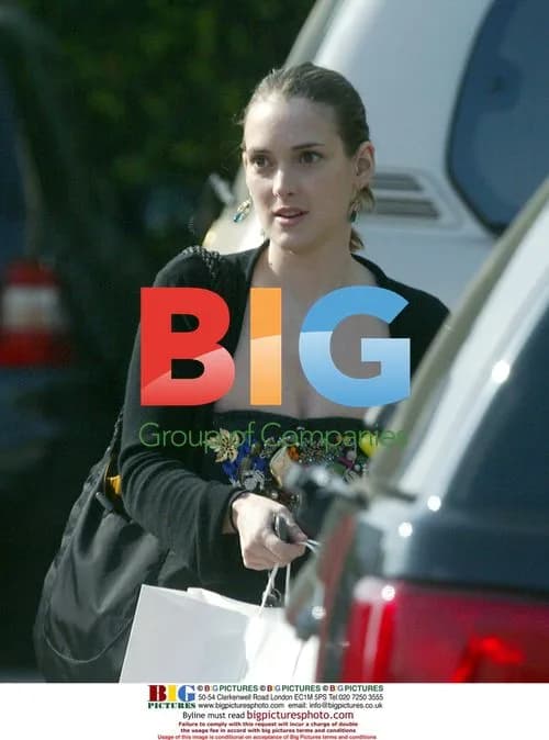 Winona Ryder Takes Smoke Break During Shopping