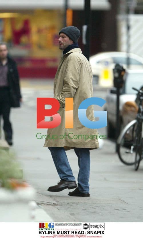 WOLLY in Beige Sweater and Jeans