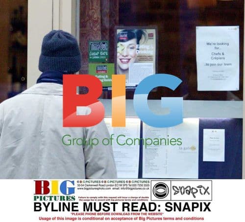 Celebrity in Beige Coat and Scarf