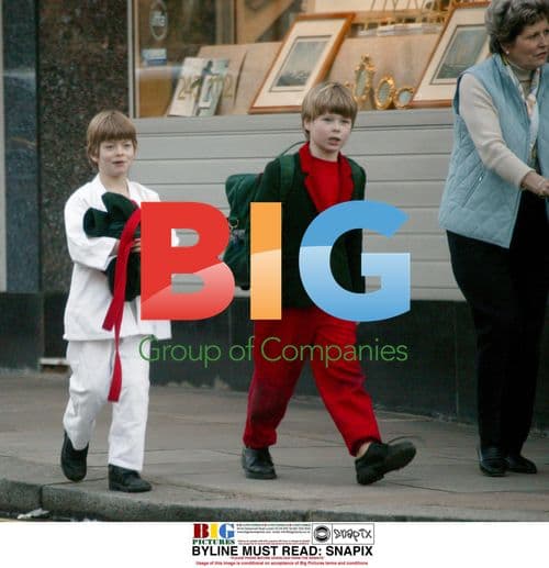 Columbus and Cassius Taylor with baby sister Elouise