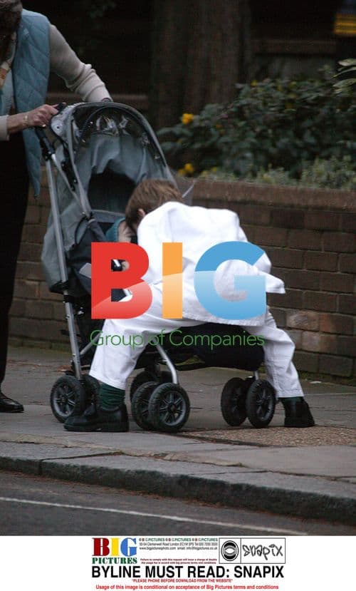 Columbus and Cassius Taylor with baby sister in London