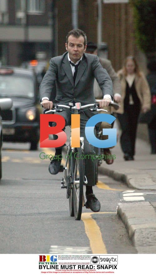 Musican Piers Adams Rides Bike in London