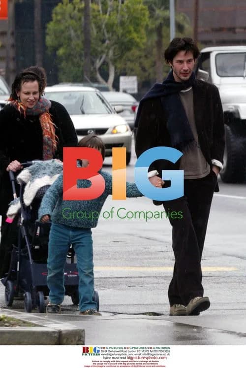Keanu Reeves Helps Niece in Rain