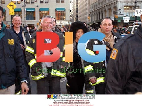 Deborah Harry escorted by New York City's Bravest