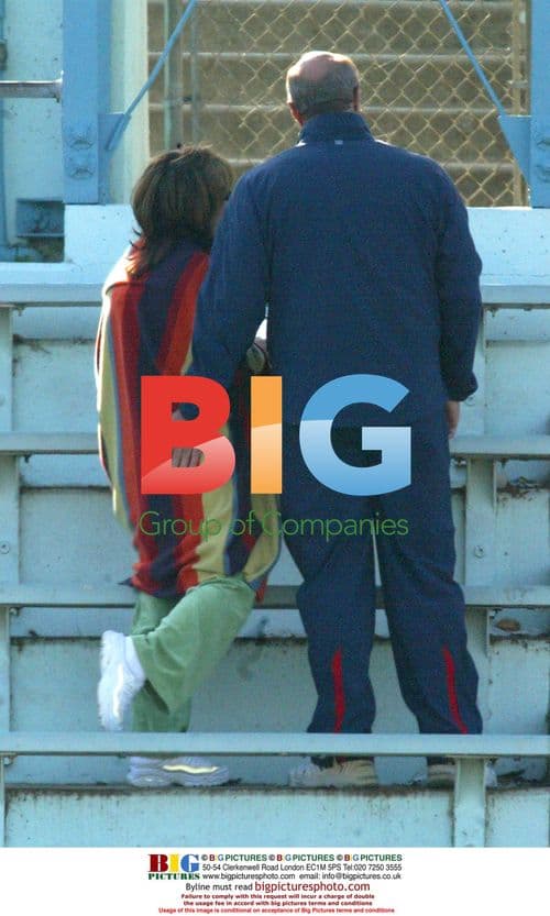 Dr Phil and Wife Support Son at Softball Game