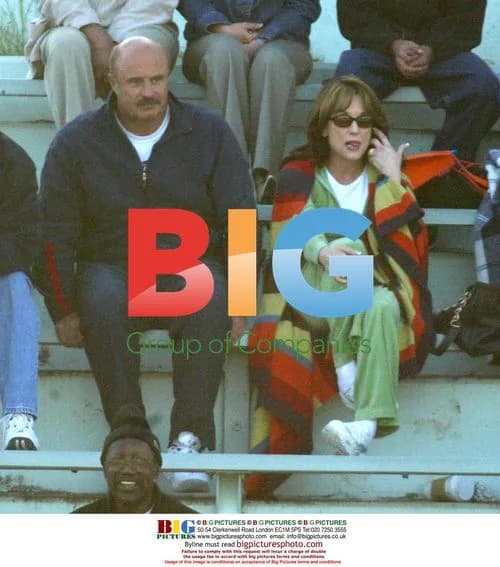 Dr Phil and Wife Support Son at Softball Game