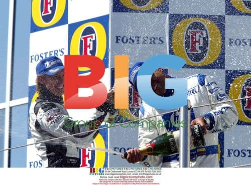 Jenson Button and Juan Pablo Montoya on podium