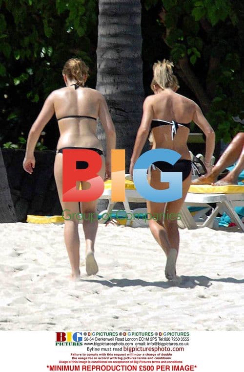 Joanna Taylor Relaxing at Beach Resort