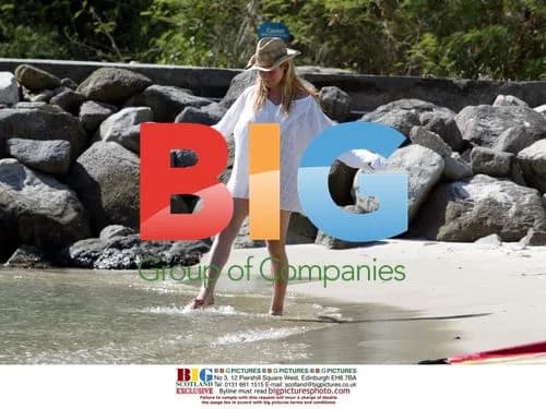 Abi Titmuss Practicing Yoga on Beach