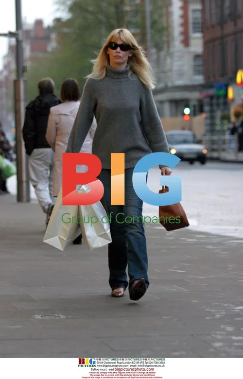 Claudia Schiffer Shopping at Gap in London