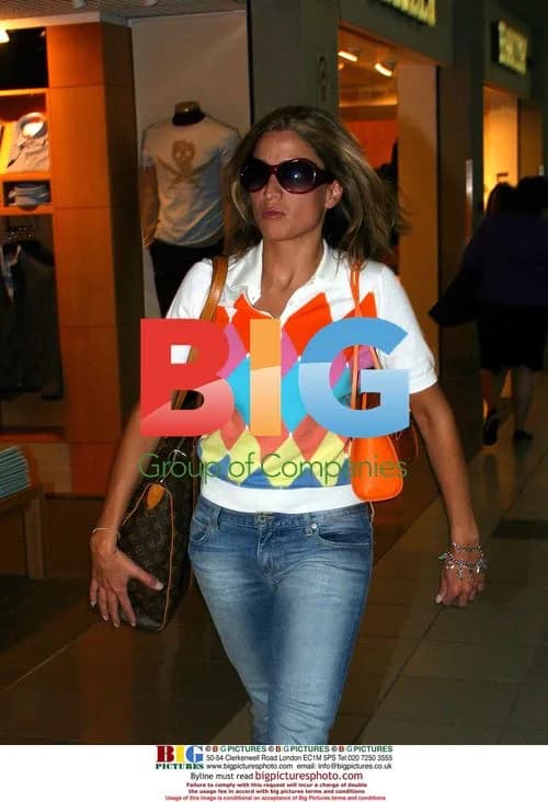 Rebecca Loos at Heathrow airport