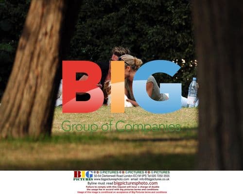 Nell McAndrew and Phil T sunbathing in Regents Park