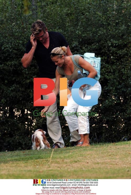 Nell McAndrew and Phil T Sunbathing in Park