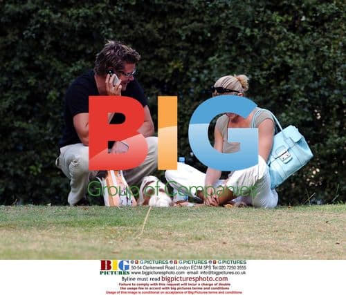 Nell McAndrew and Phil T Sunbathing