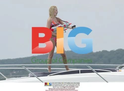Glamour Models Shoot Water Guns on Boat