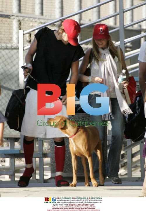 Mira Sorvino Watches Husband Chris Backus Play Baseball