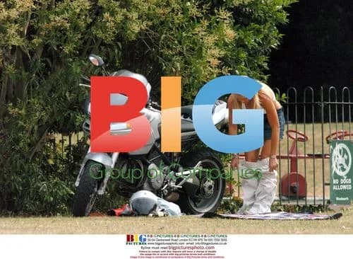 Louise Brady Doing Yoga on Motorcycle