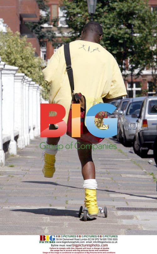 Chris Eubanks Riding Scooter