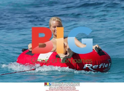 Glamour model spins on donut in France