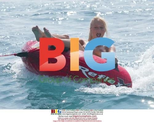 Glamour model Anna Taverner on donut in France