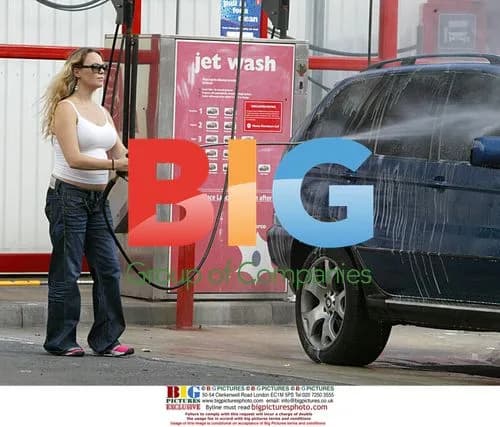 Pregnant Actress Charlie Brooks Spraying Boyfriend