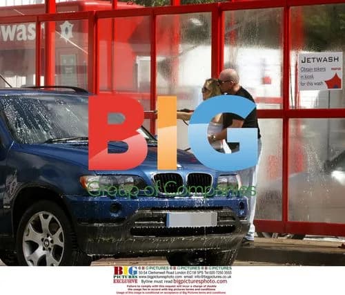 Pregnant Charlie Brooks Cleans BMW with Boyfriend