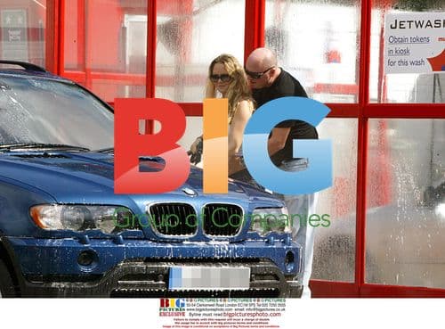 Pregnant Charlie Brooks Cleans BMW with Boyfriend