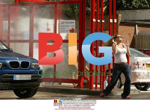 Pregnant Actress Charlie Brooks Cleans Car