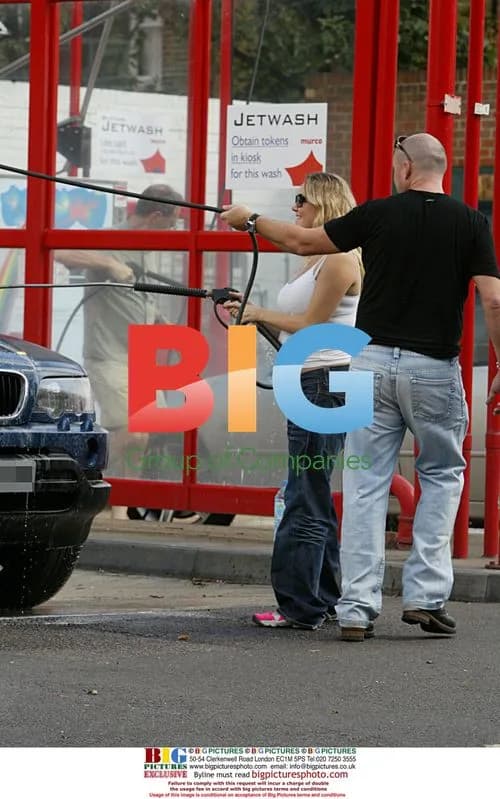 Pregnant Charlie Brooks Cleans Car with Boyfriend
