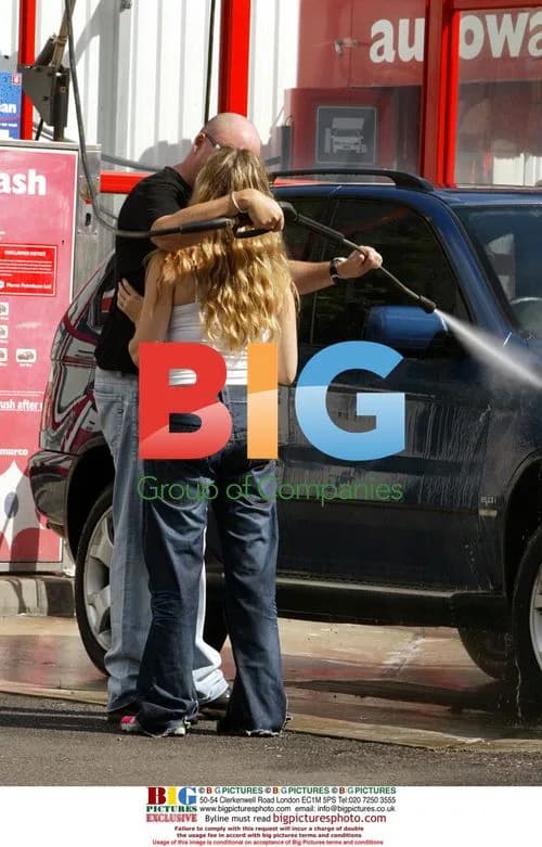 Pregnant Actress Charlie Brooks Cleans Car with Boyfriend
