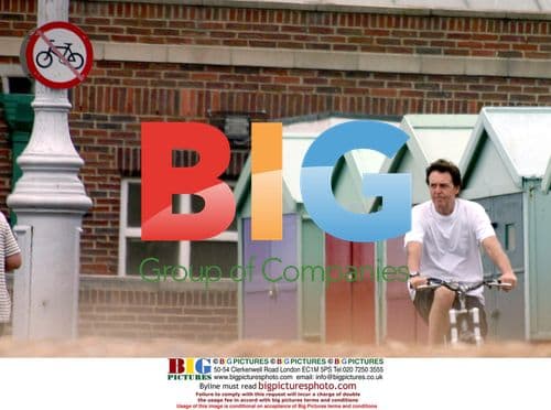 Paul McCartney Cycling with Heather