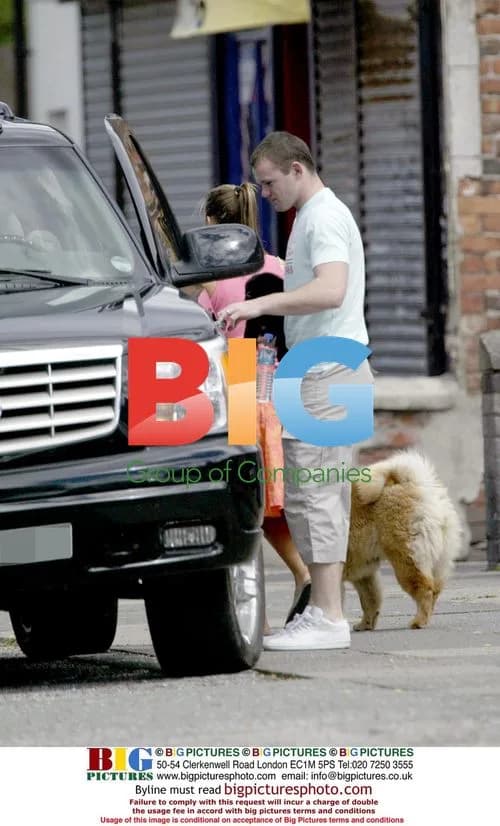 Wayne Rooney and Coleen with Dog