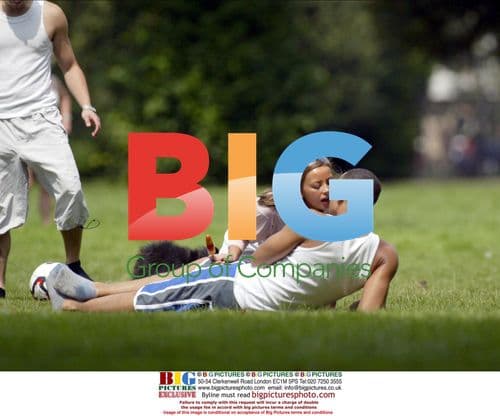 Singer Charlotte Church and boyfriend in park