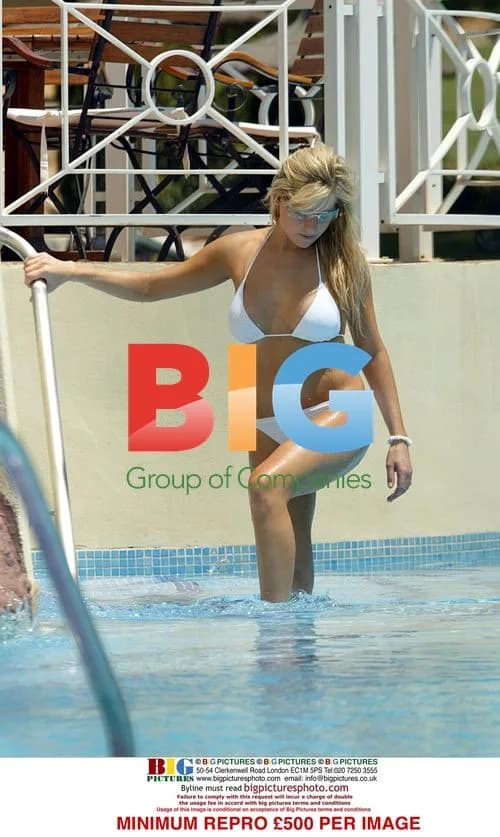Abi Titmuss relaxes in Spain