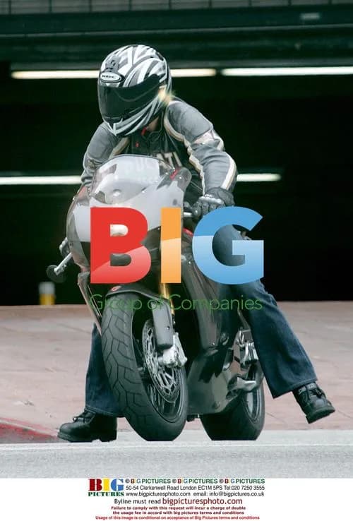 Tom Cruise leaving the Ivy on his Ducati