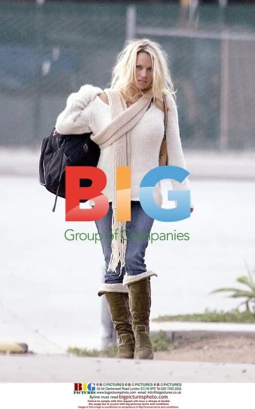 Pamela Anderson Carrying Backpacks in Malibu