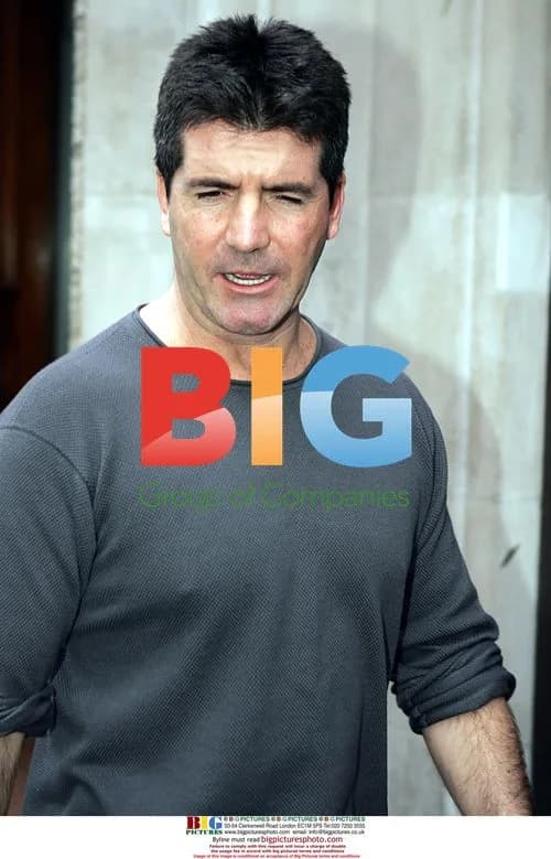 Simon Cowell Leaves Home for Busy Day