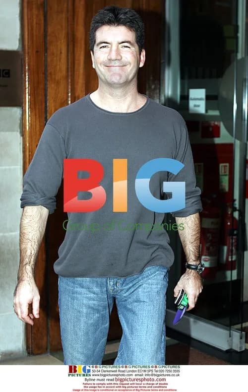 Simon Cowell Leaves Home for Busy Day